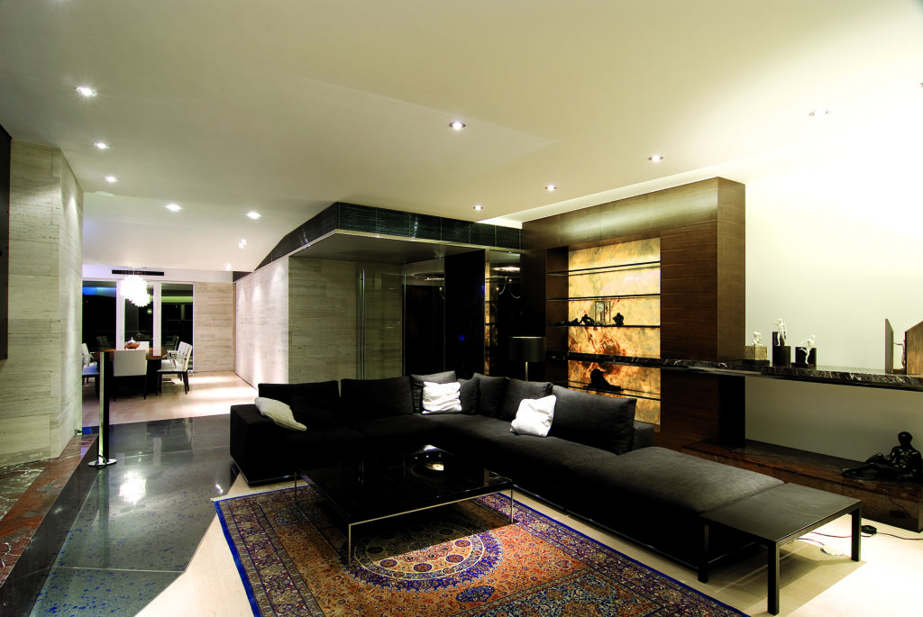 Recessed lighting layout tips can help your style your living room like this one.