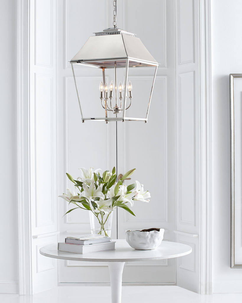 Bright-and-airy foyer lighting ideas include the Feiss Galloway 18 Inch Cage Pendant by Generation Lighting