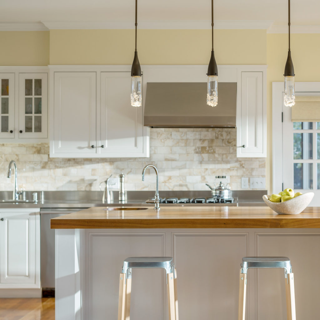 This kitchen island lighting guide explains why the Fritz Mini Pendants can make a big impact