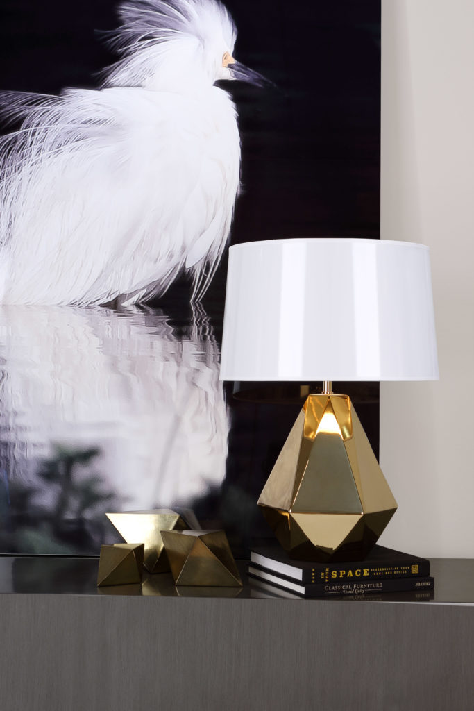 Gold goes extra-bold with this geometric table lamp by Robert Abbey