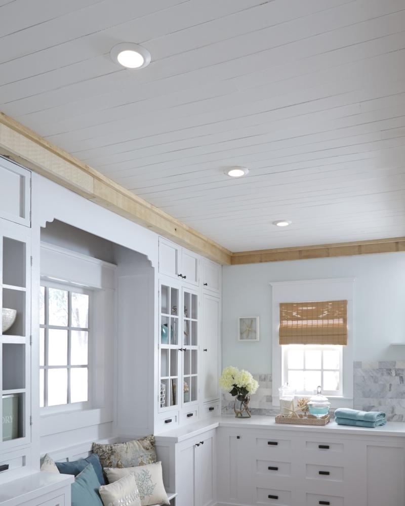 Traverse recessed lighting on white wood ceiling shines in high-trafficked laundry, kitchen or bath | Capitol Lighting