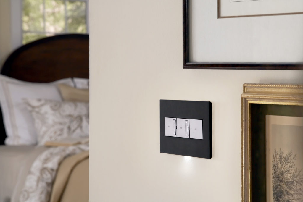 Matte black Adorne dimmer switch allows for completely customized romantic bedroom lighting | Capitol Lighting