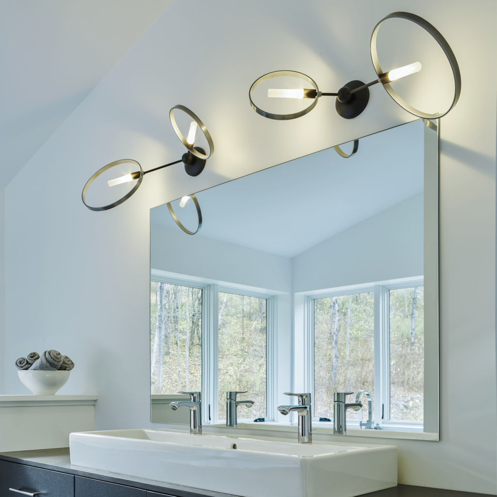 Unique bathroom lighting can be simple, like the bold, two-ring Celesse Wall Sconce. 