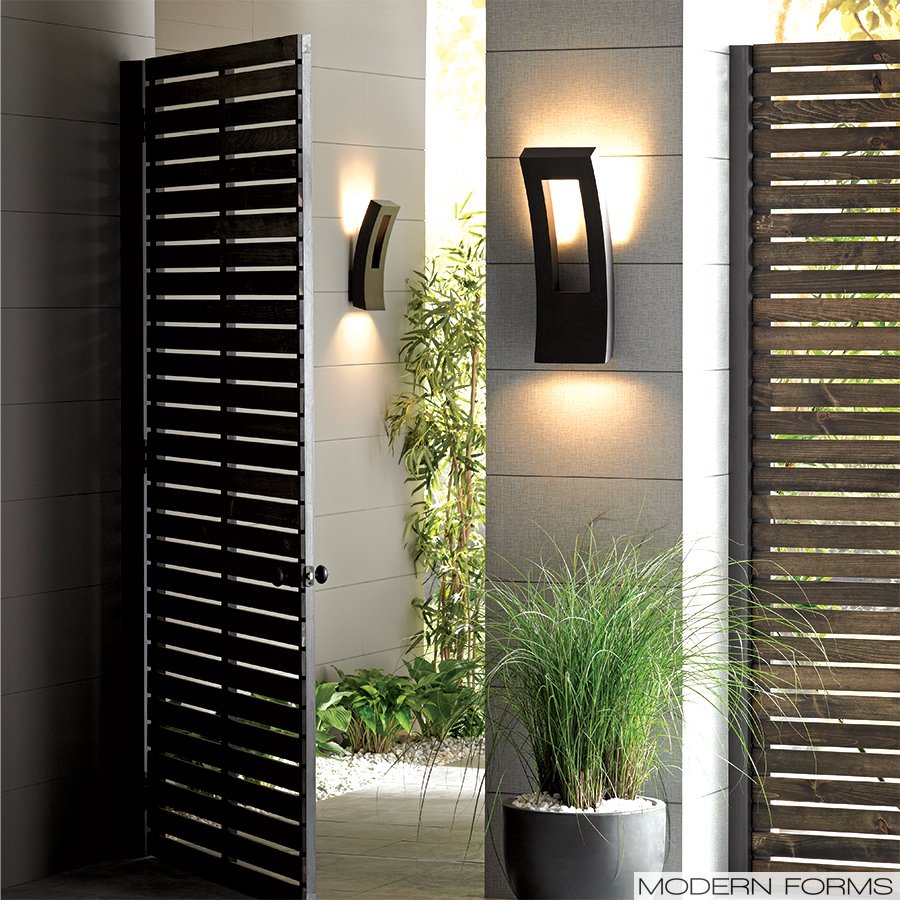 The modular Dawn outdoor wall light provides max LED lighting in a contemporary-style entryway.