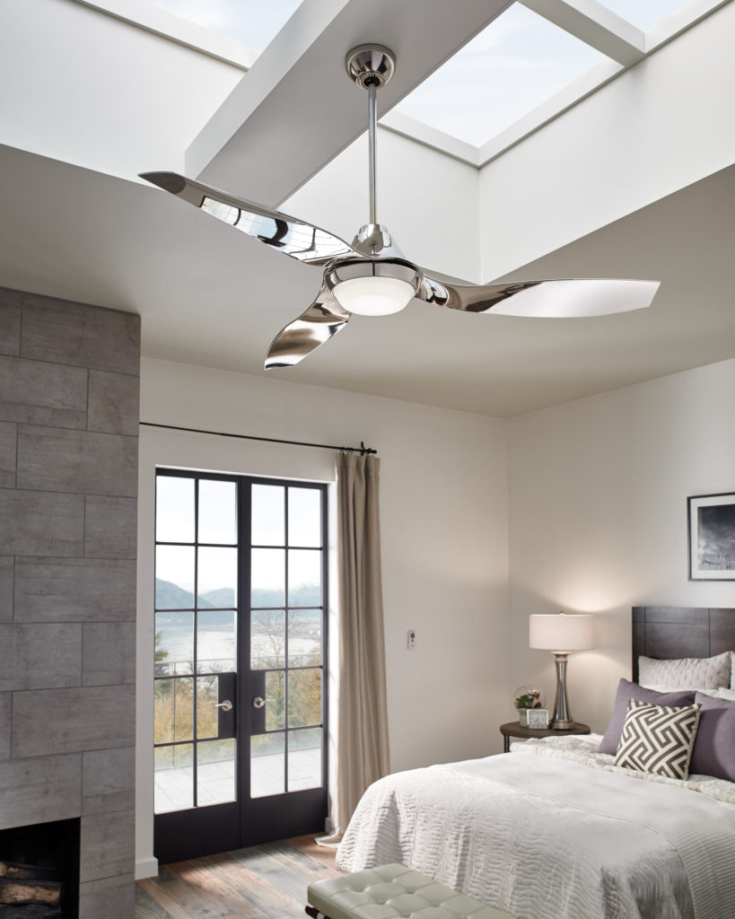 Avvo Max ceiling fan in Quicksilver reflects natural light, enhances a cool, coastal bedroom.