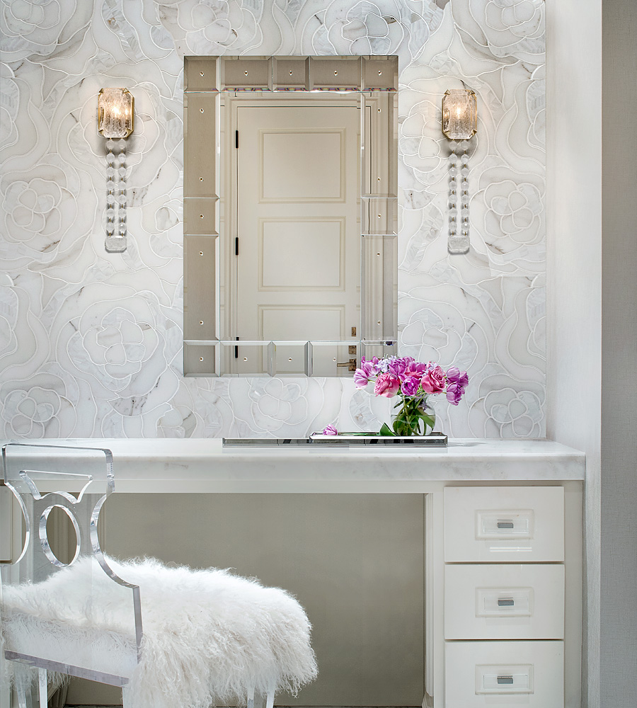 Alibi Wall Sconces on either side of a vanity mirror.