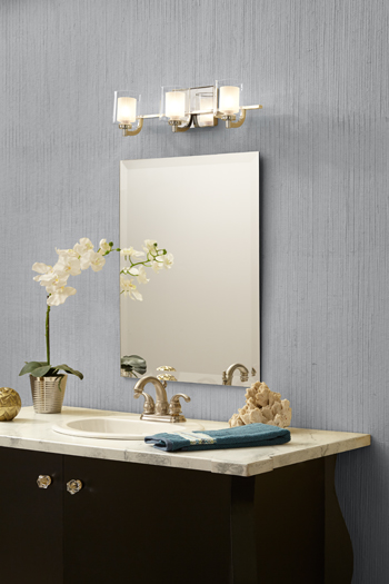 Kolt bath vanity lighting design takes an old hurricane glass and turns it upside down.