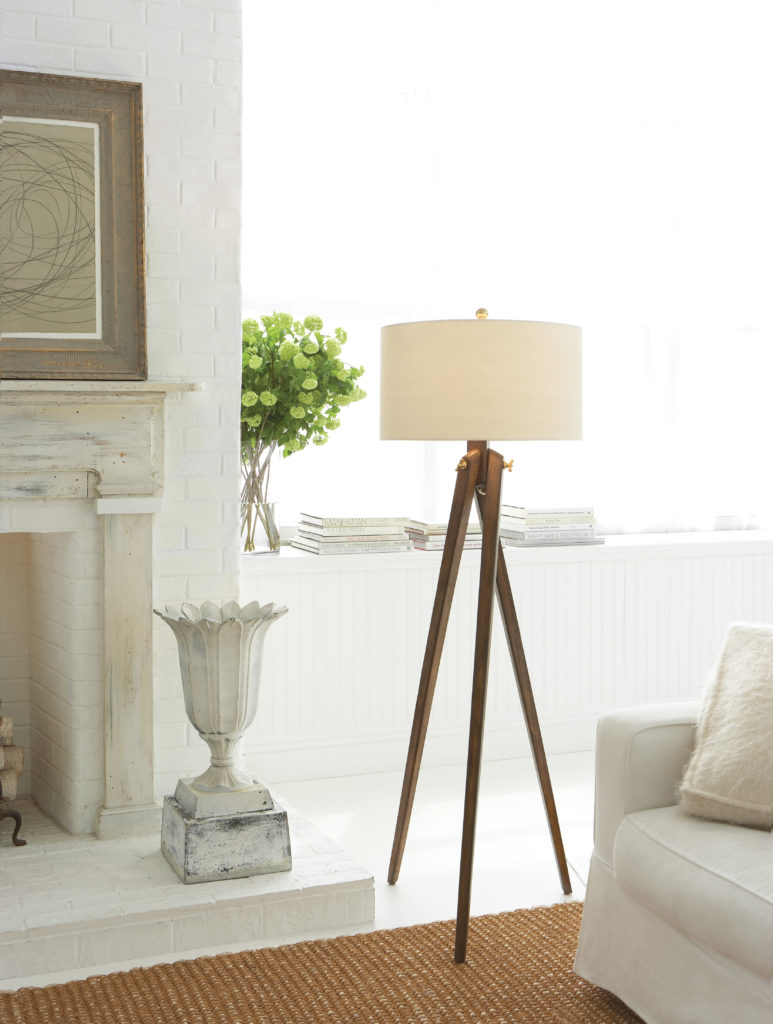 Place the Tripod floor lamp next to your beautiful brick fireplace to create accent lighting. 