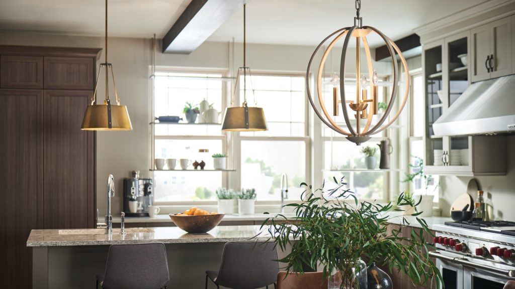 a modern kitchen with pendant lighting by Capitol Lighting