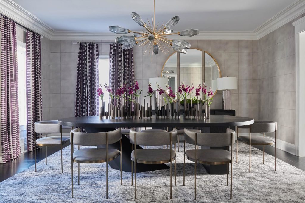 Upscale Interiors - This chandelier is an incredible focal point
